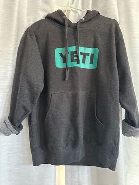 Yeti Men's Dark Charcoal Hoodie with Teal Logo